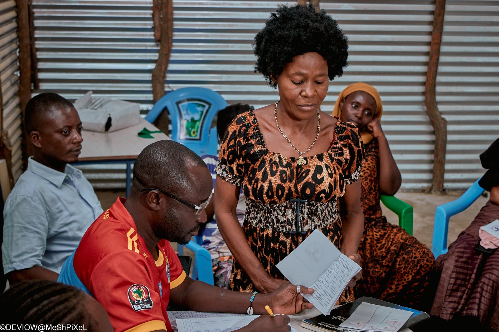 VSLA financial documentation and record-keeping session